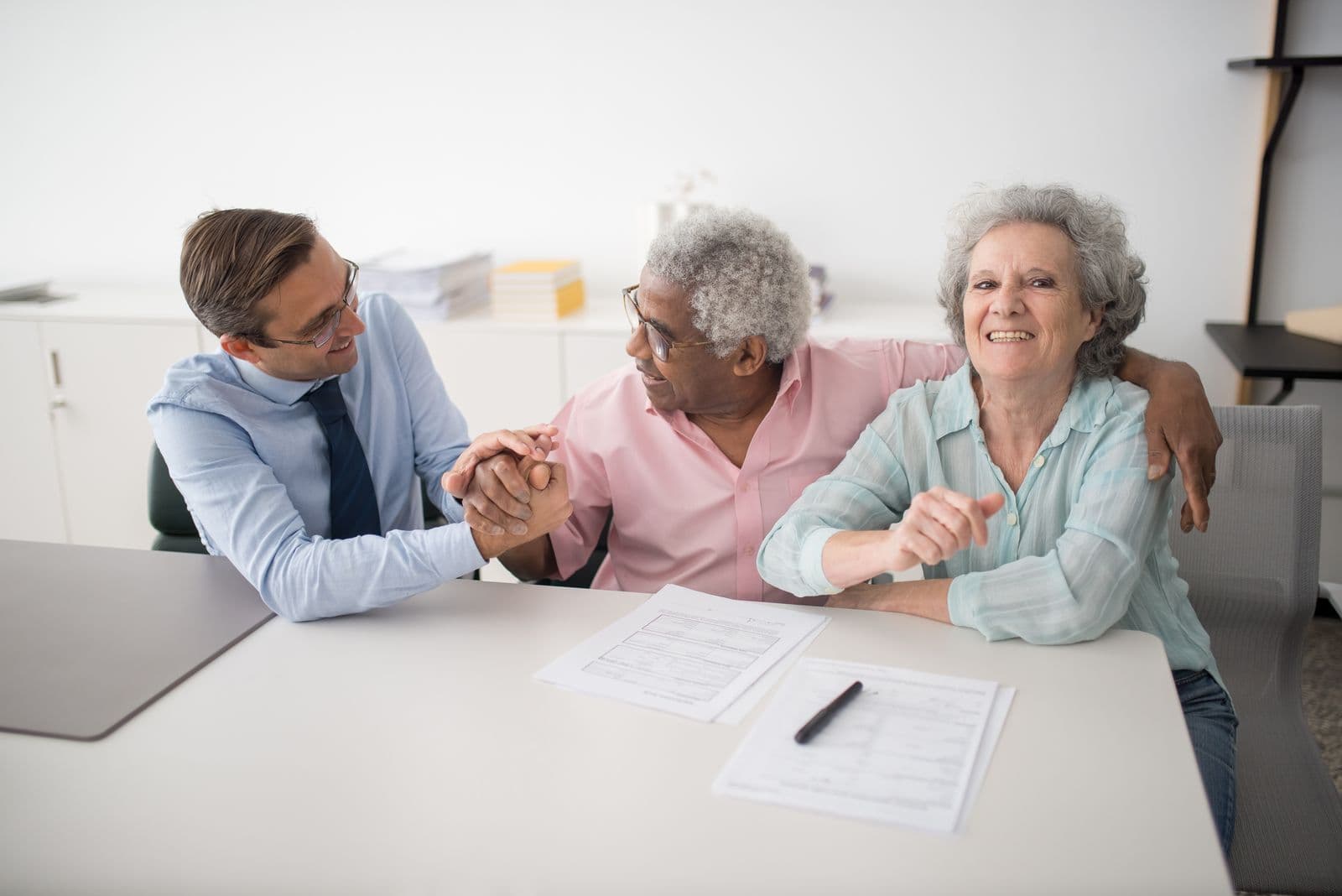 An advisor meeting with clients