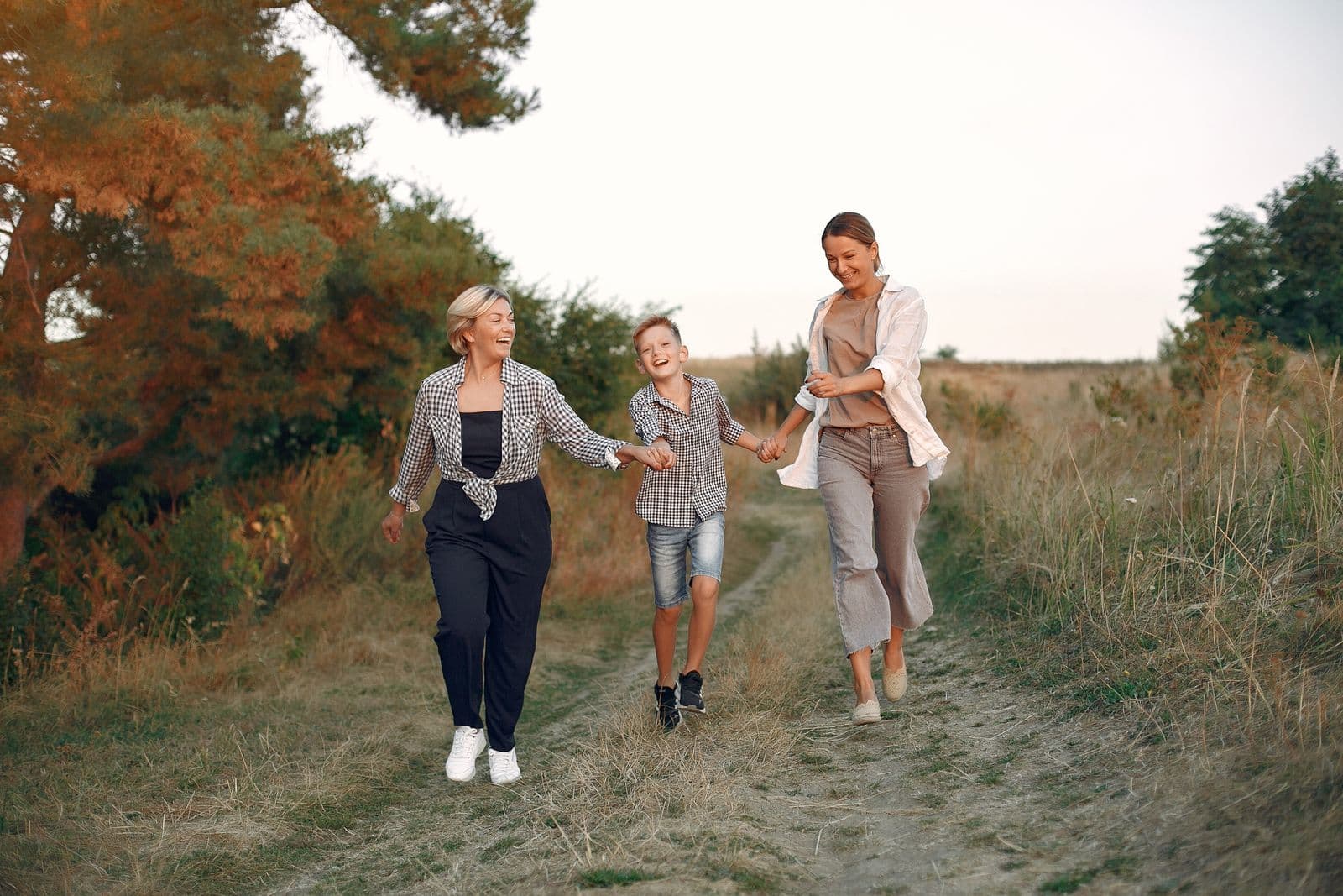 Three generations of a family together outdoors