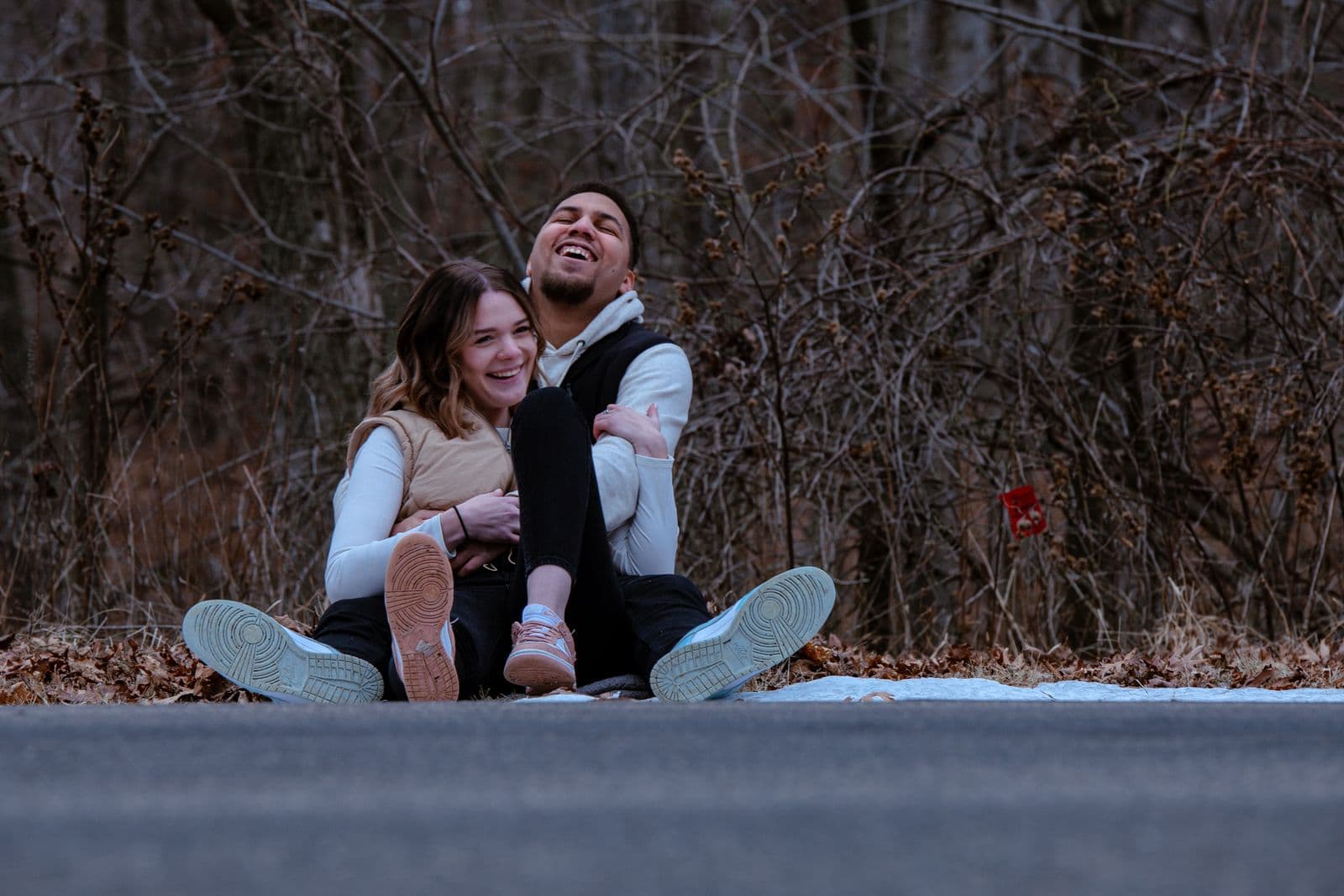A younger couple reviewing their finances at home